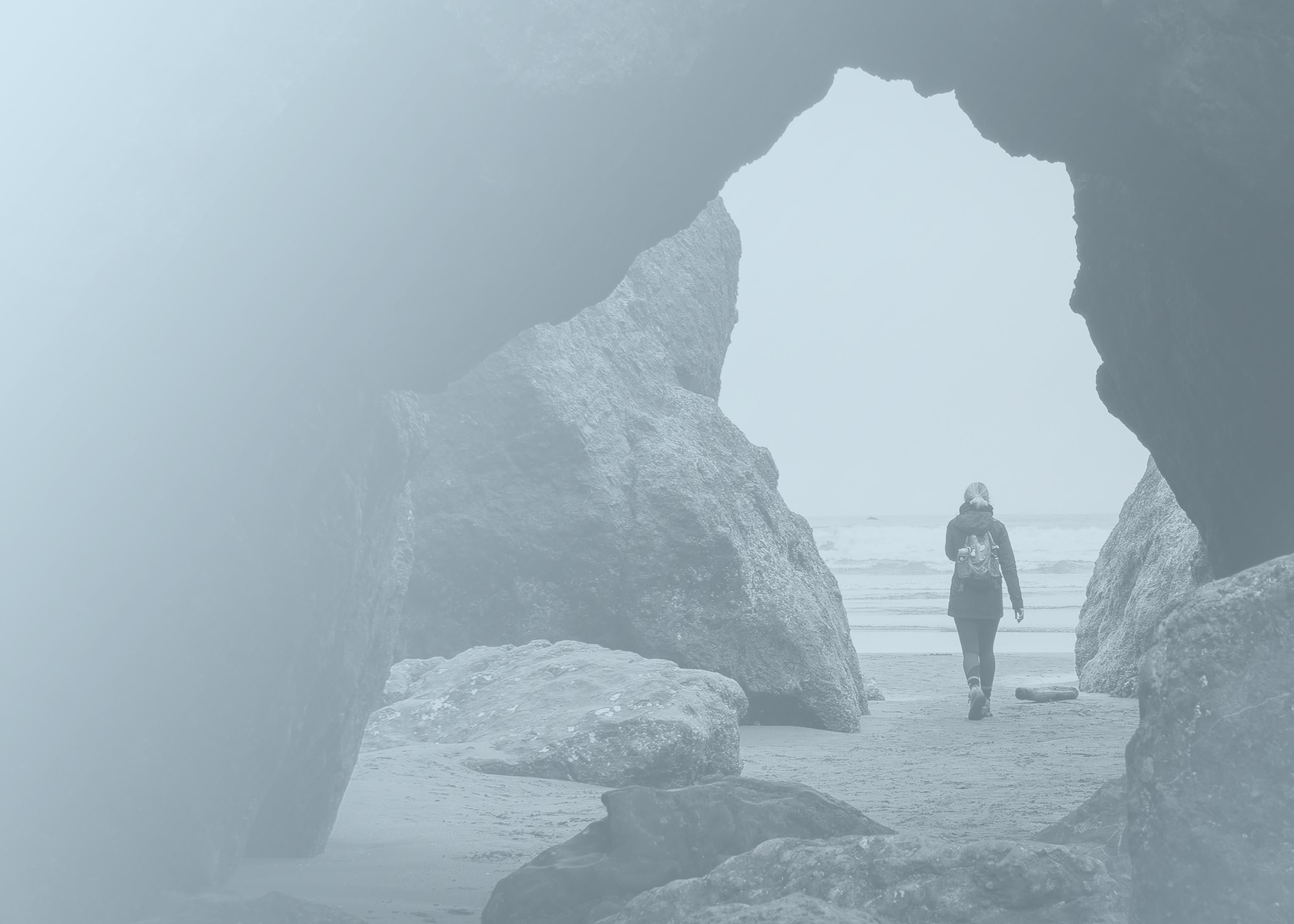 An adult woman leaving from a cave