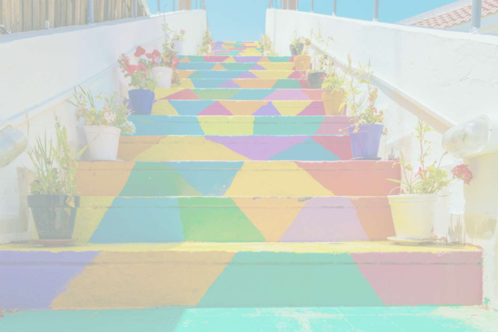 A flight of stairs with bright and diverse cultural colors.